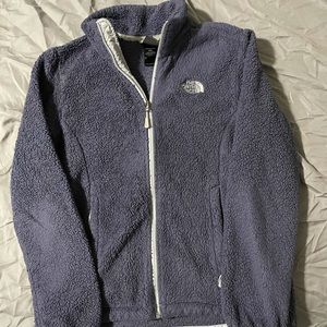 The North face zip up sweater.